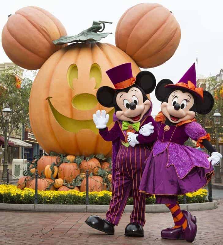 Mickey's Halloween Party - Mickey and Minnie in front of giant jack-o-lantern pumpkin