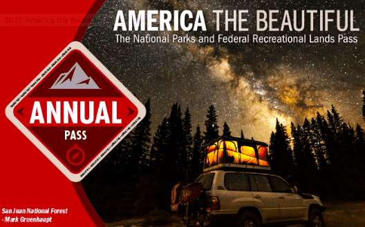 Text - America the Beautiful. The National Parks and Federal Recreational Lands Pass. Image of SUV with tent on top under starry sky, and Annual Pass logo