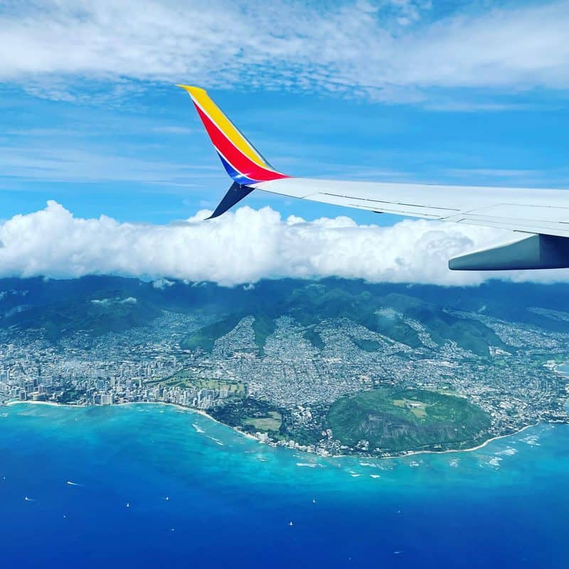 A view of hawaii from the wing of an airplane.