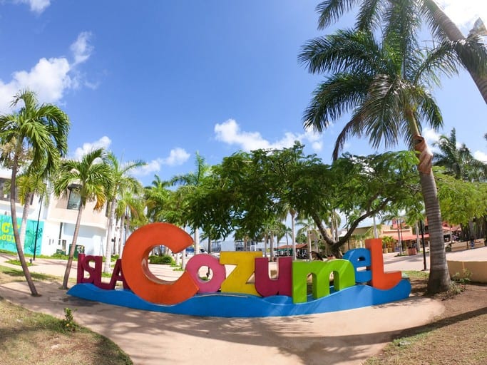 A sign showcasing things to do in Cozumel.