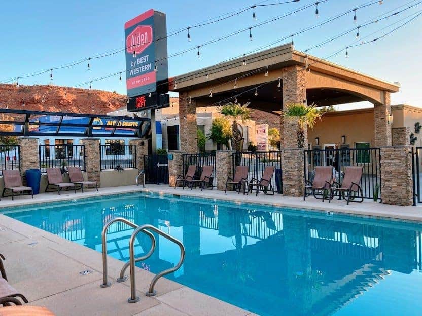 A swimming pool at a motel in the desert.