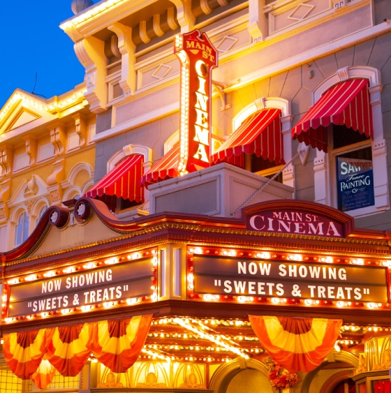 A movie theater at night.