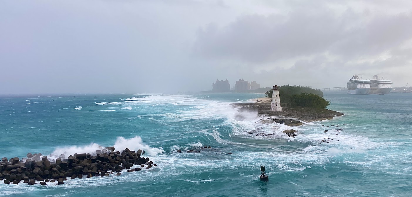 Cruise ships, Atlantis and the Nassau lighthouse on a blustery day in Nassau Bahamas