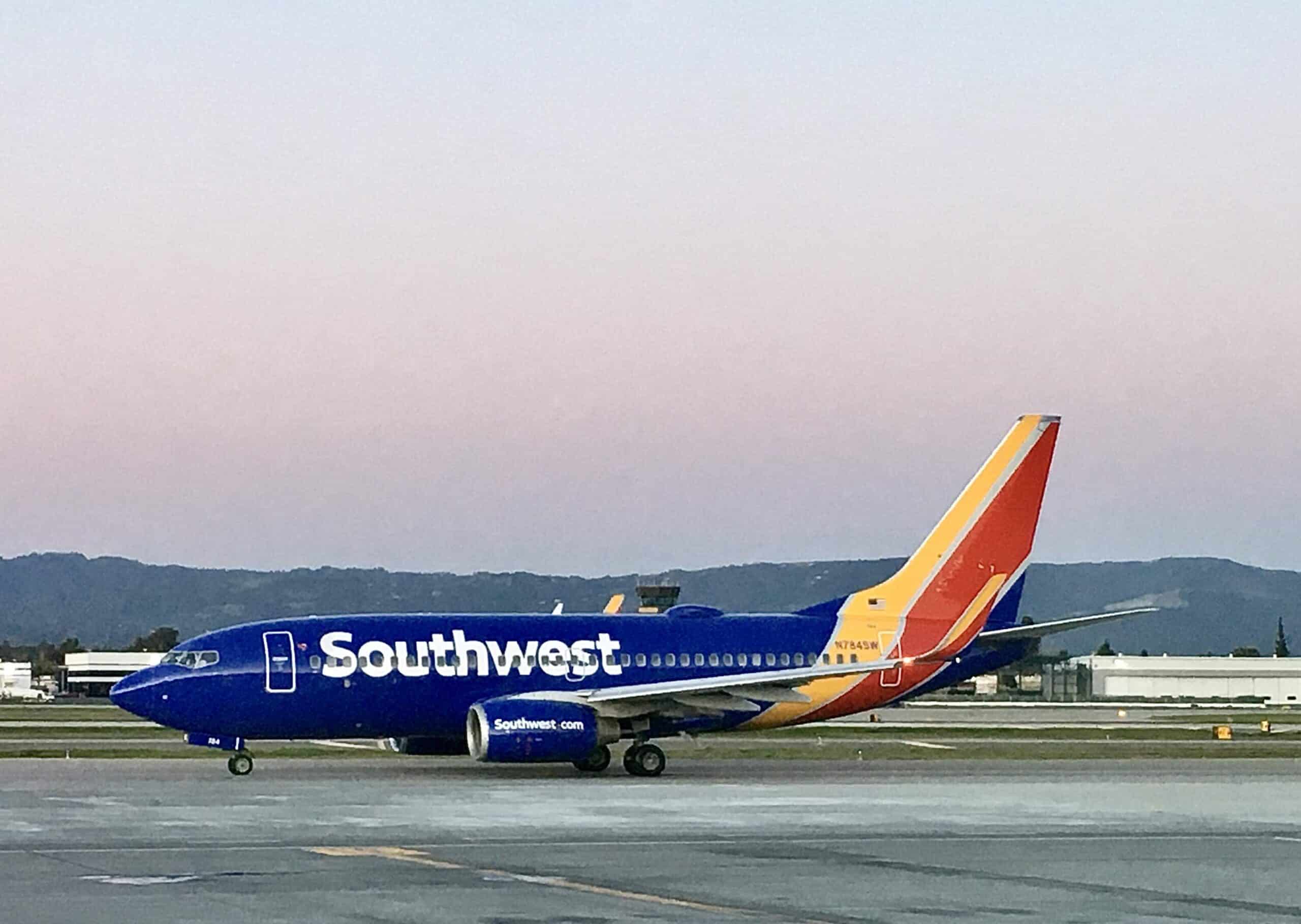 Southwest plane taxing runway